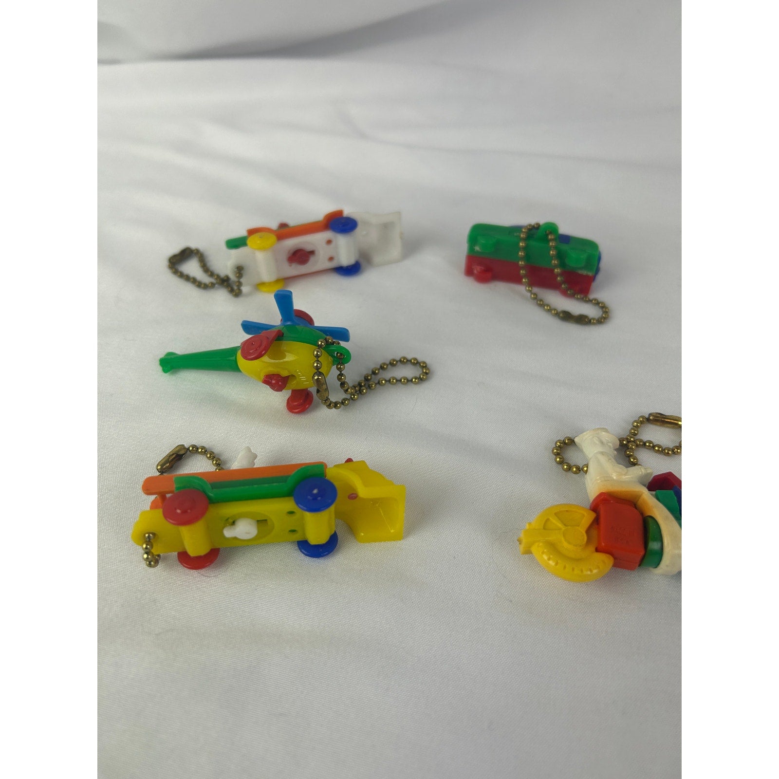 Vintage 1950s Vehicle Puzzle Keychain Lot Fire Truck Helicopter Toy