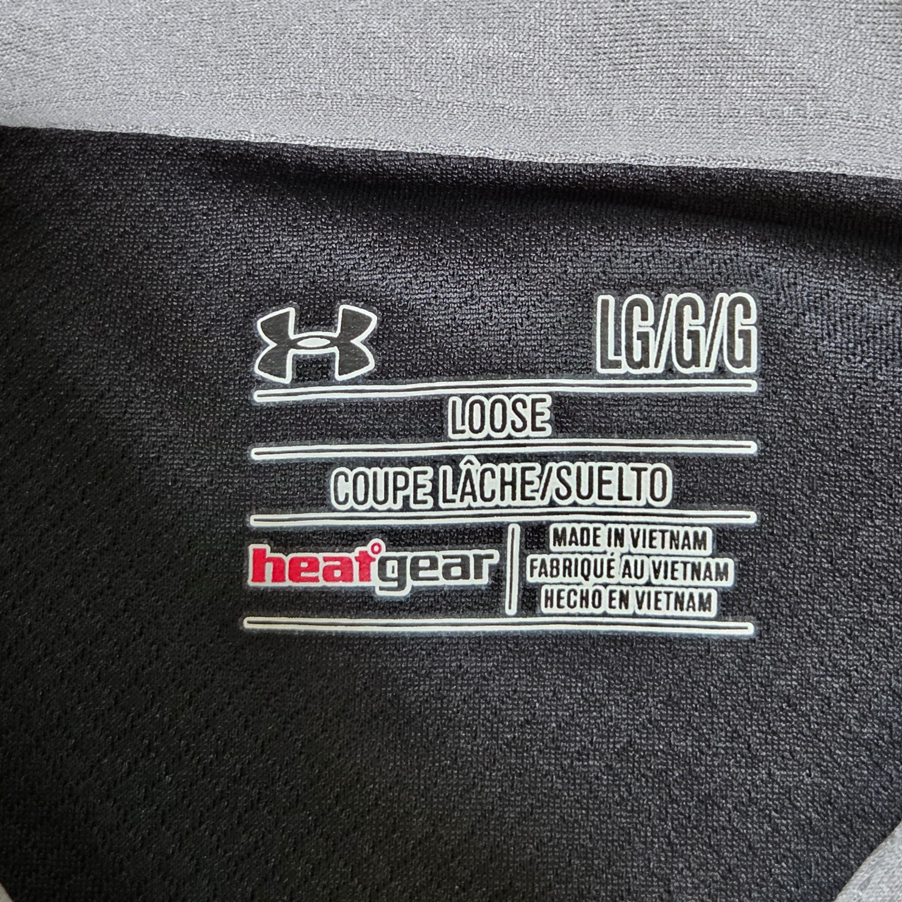 Under Armour Men's LG Black Golf Shirt with gray stipe and inside collar