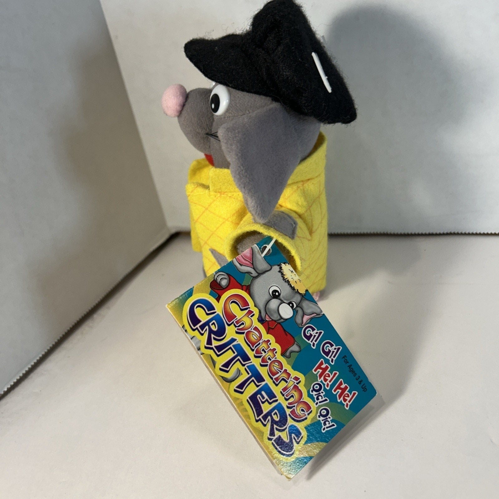 Chattering Critter Mouse Wearing a Yellow Shirt and a Black Hat