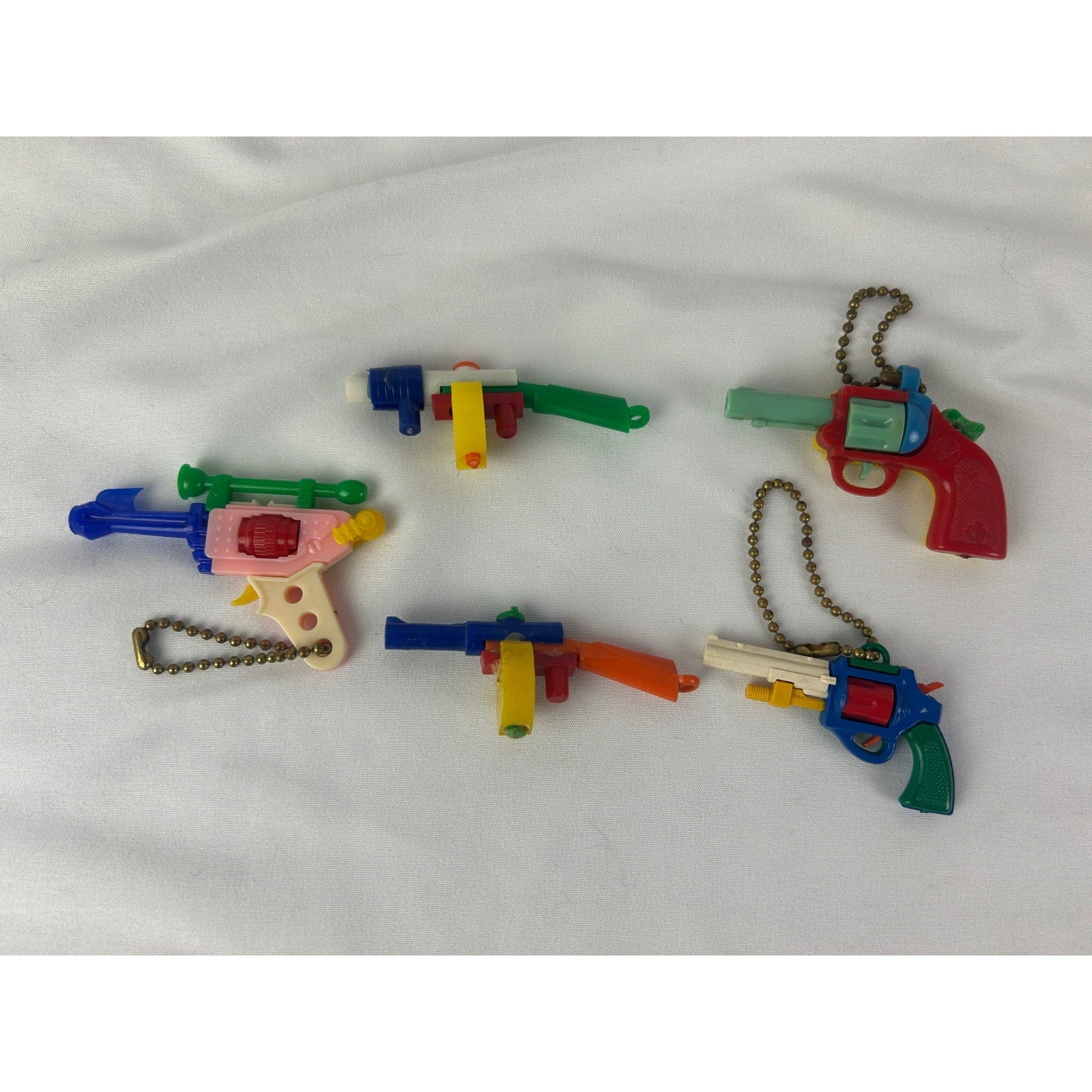 Vintage 1950s Puzzle Keychain Toy Gun Lot Western Revolvers Rifles
