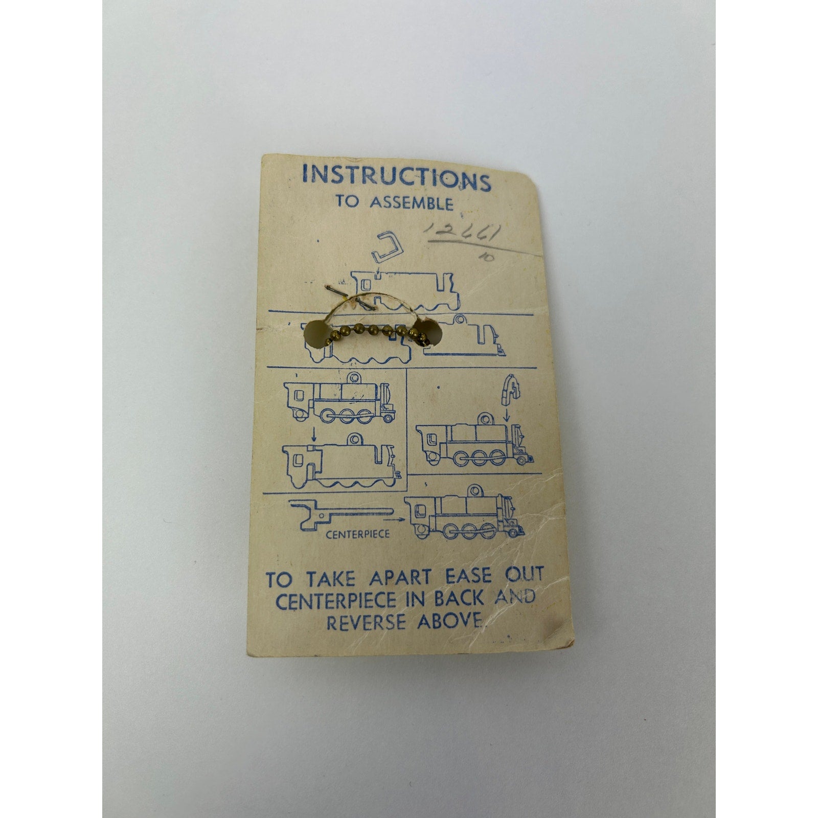 Vintage Loco-Motive Key Chain Puzzle Train 1950s Plastic Toy on Display Card