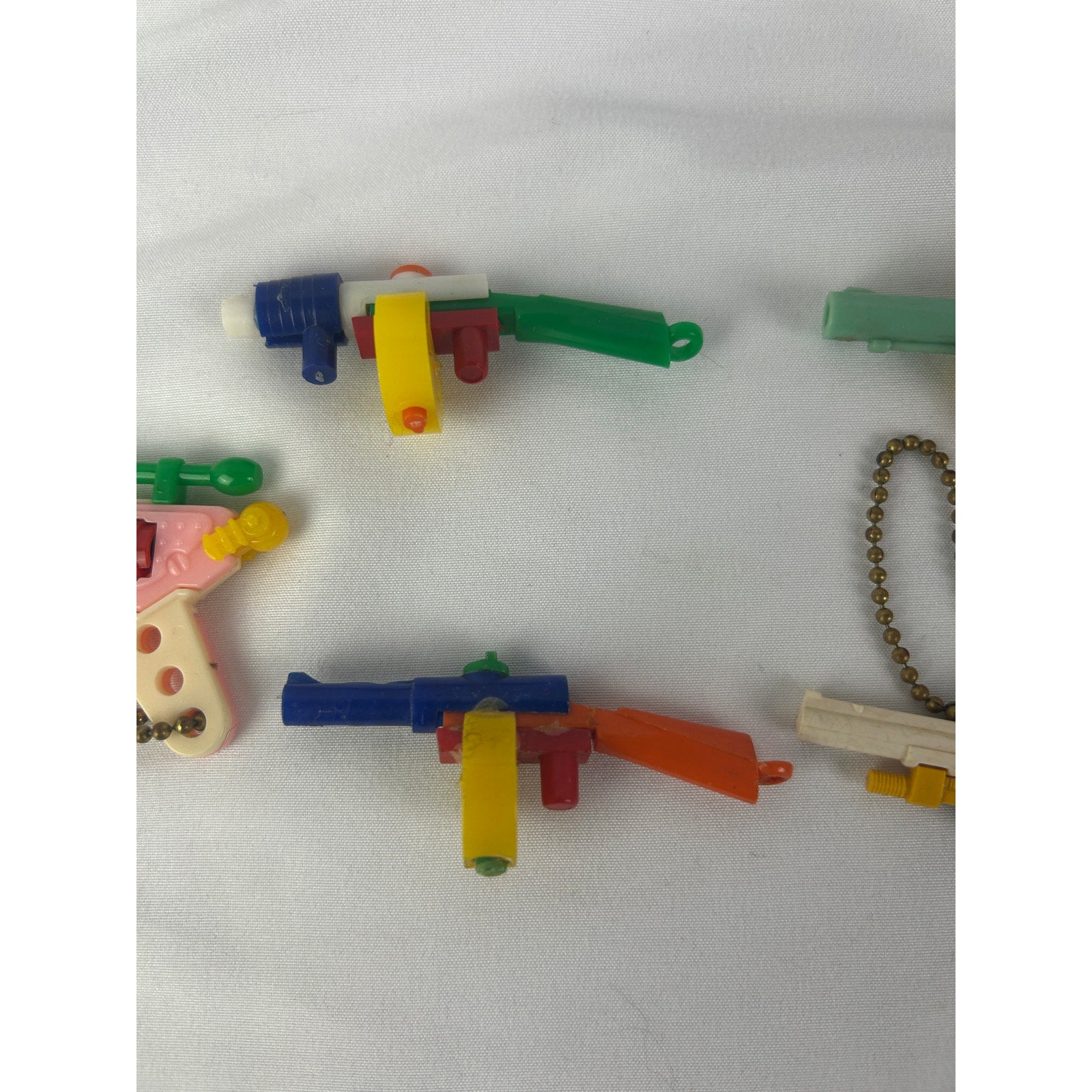 Vintage 1950s Puzzle Keychain Toy Gun Lot Western Revolvers Rifles