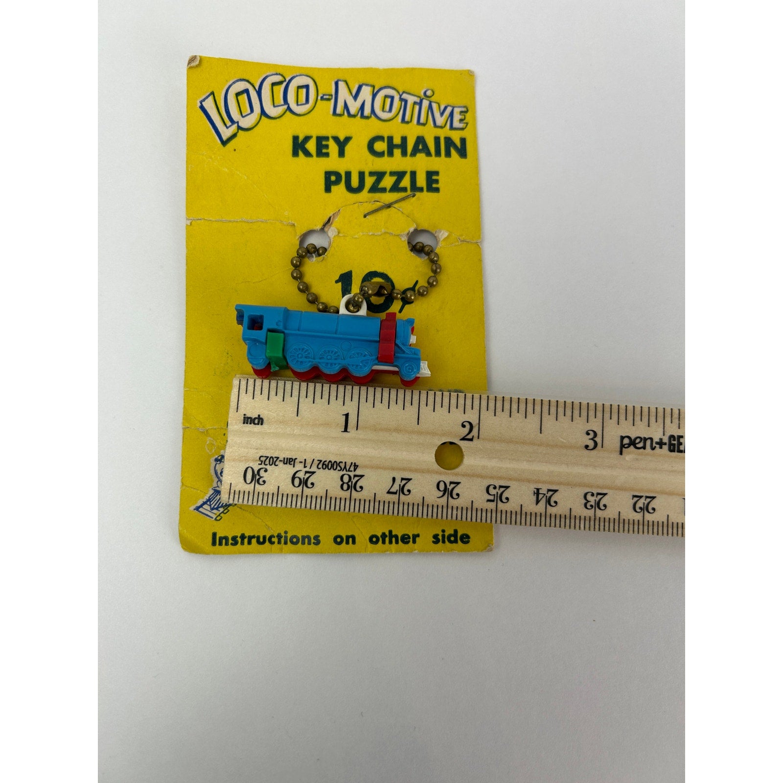 Vintage Loco-Motive Key Chain Puzzle Train 1950s Plastic Toy on Display Card