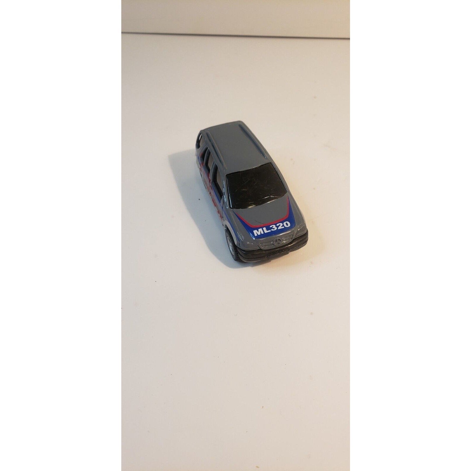 Maisto Tonka 2000 Mercedes-Benz ML 320 SUV Gray w/Red Lettering 1:64