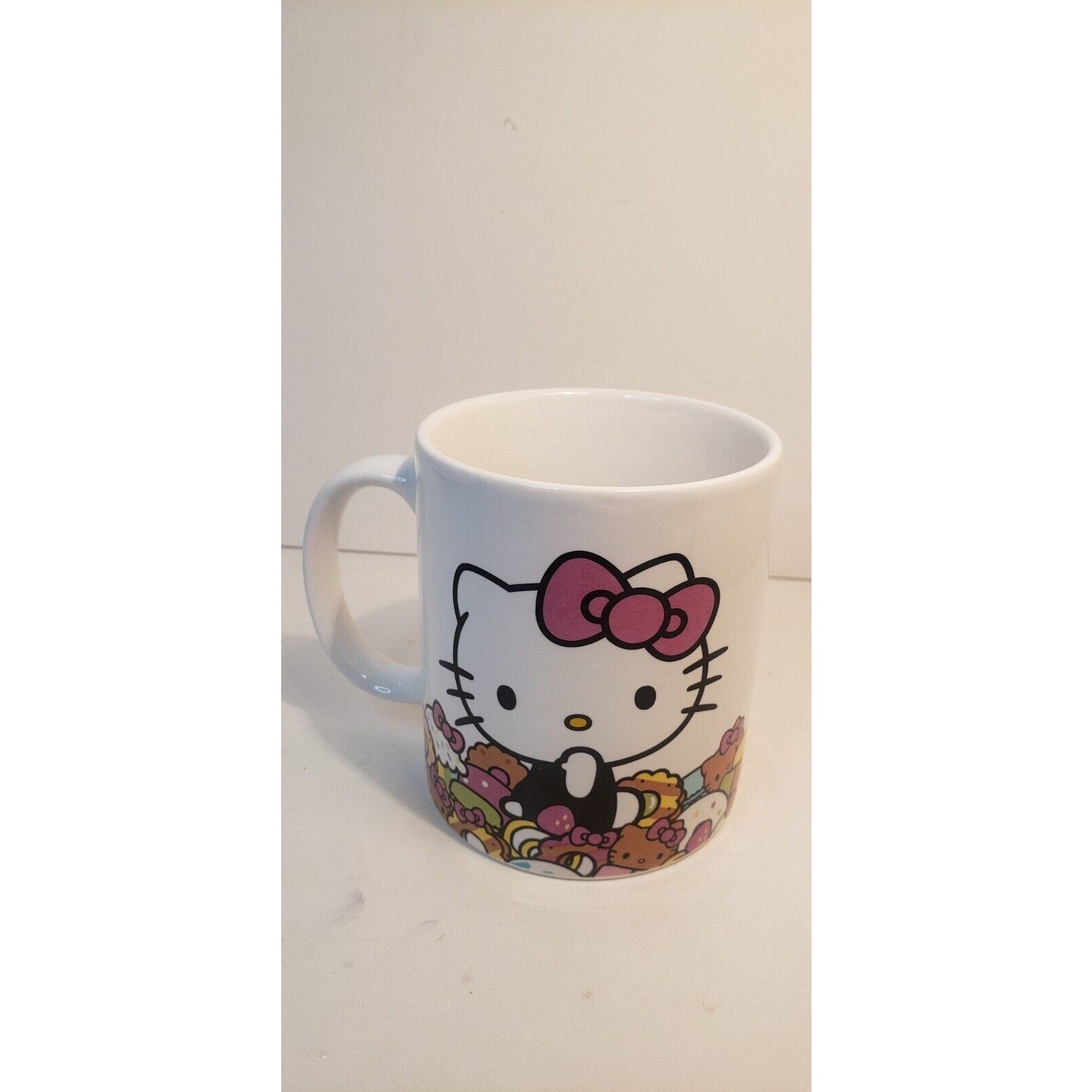 Hello Kitty Cafe Sanrio 2015 Ceramic Coffee Cup Exclusive Collectors Donuts Mug