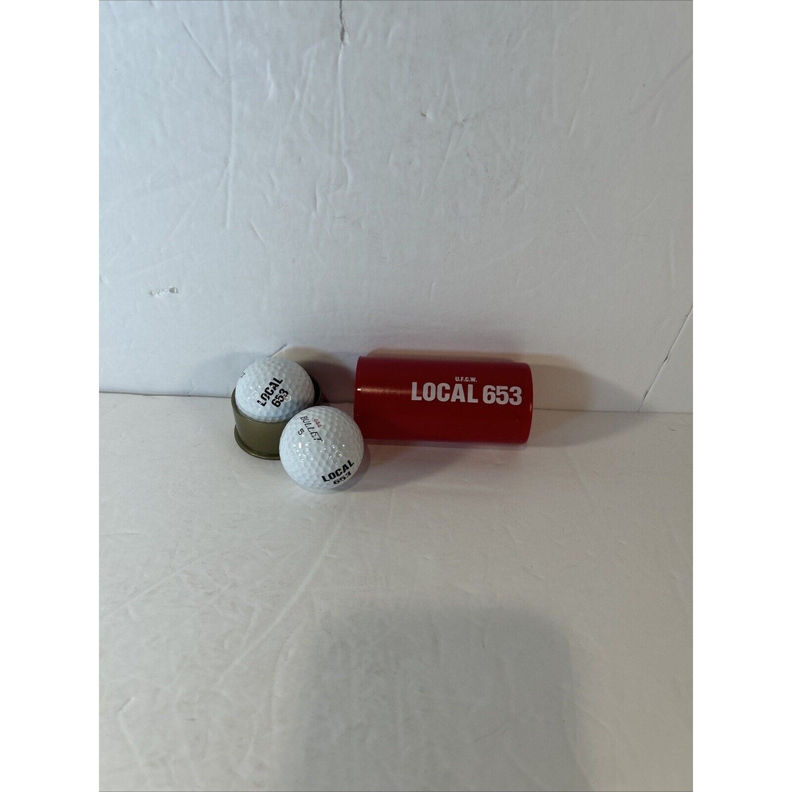 Bullet Golf Ball in holder that looks like shotgun shell-Las Vegas