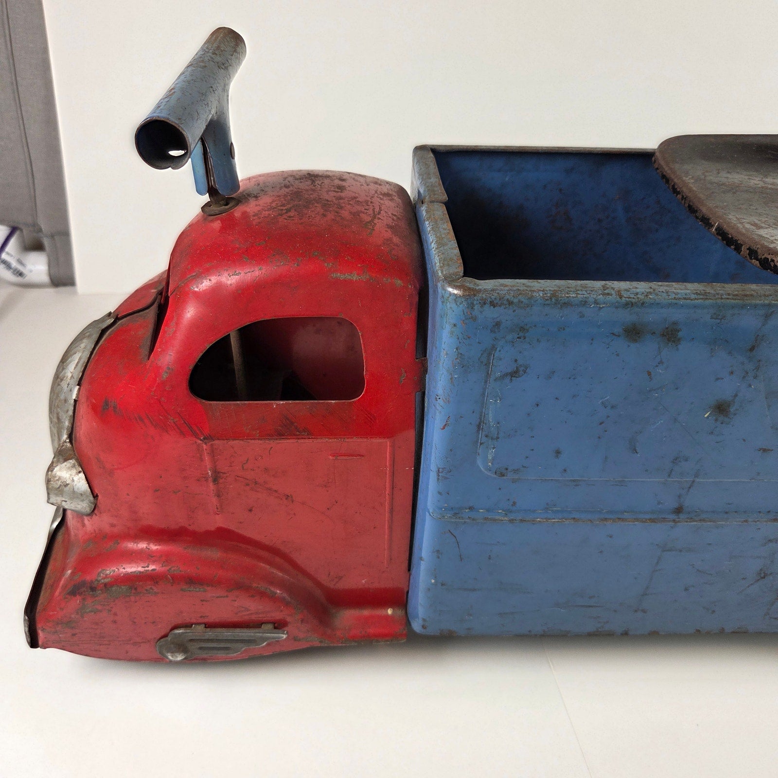 Louis Marx Ride On Toy Truck Vintage Pressed Steel Snap Mascot Graphic