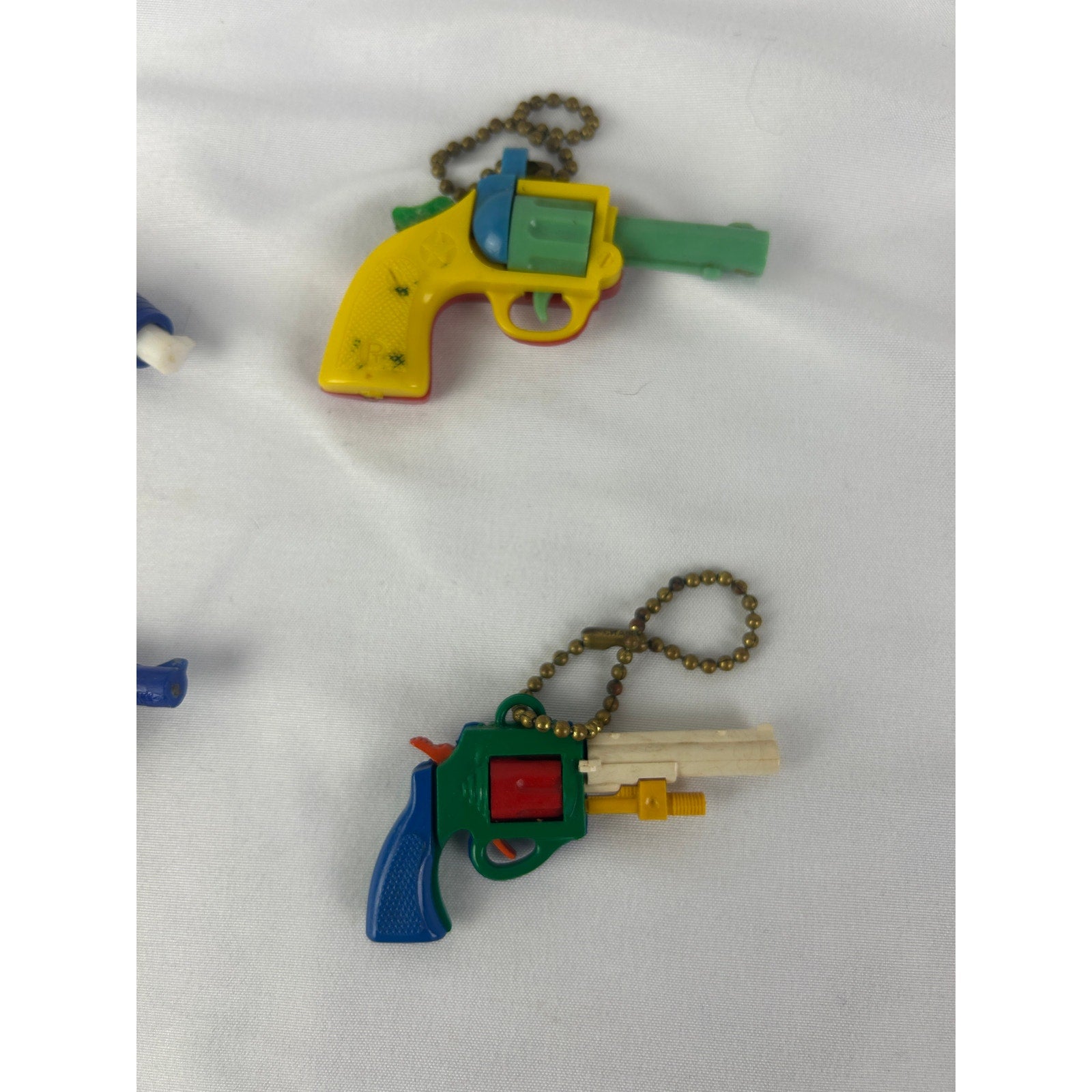 Vintage 1950s Puzzle Keychain Toy Gun Lot Western Revolvers Rifles