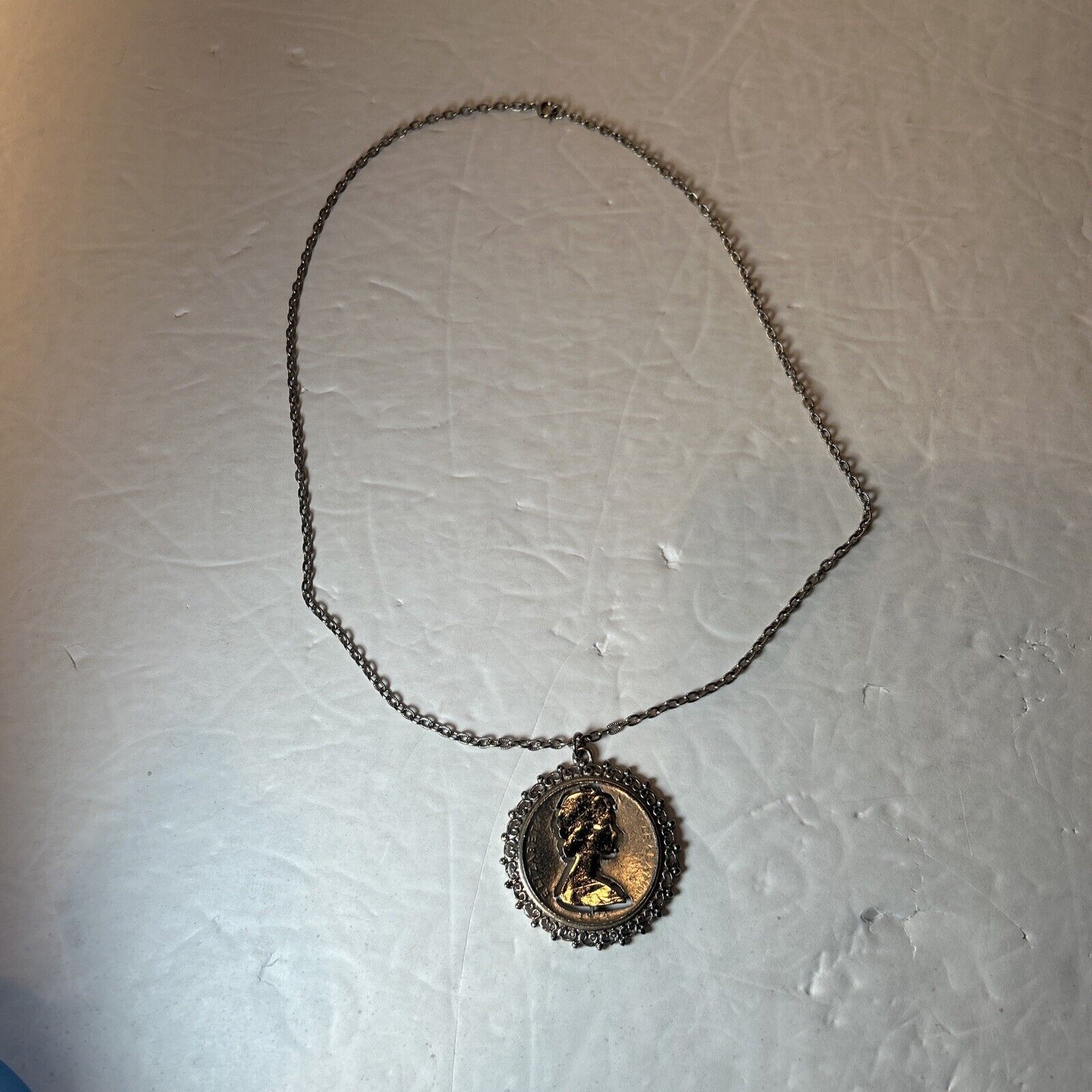 1974 Elizabeth II New Zealand framed cut coin 28" chain (315)