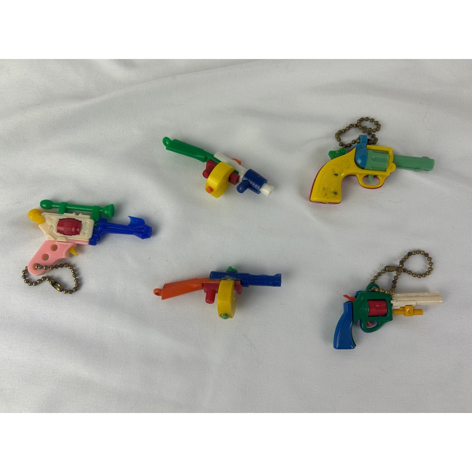 Vintage 1950s Puzzle Keychain Toy Gun Lot Western Revolvers Rifles