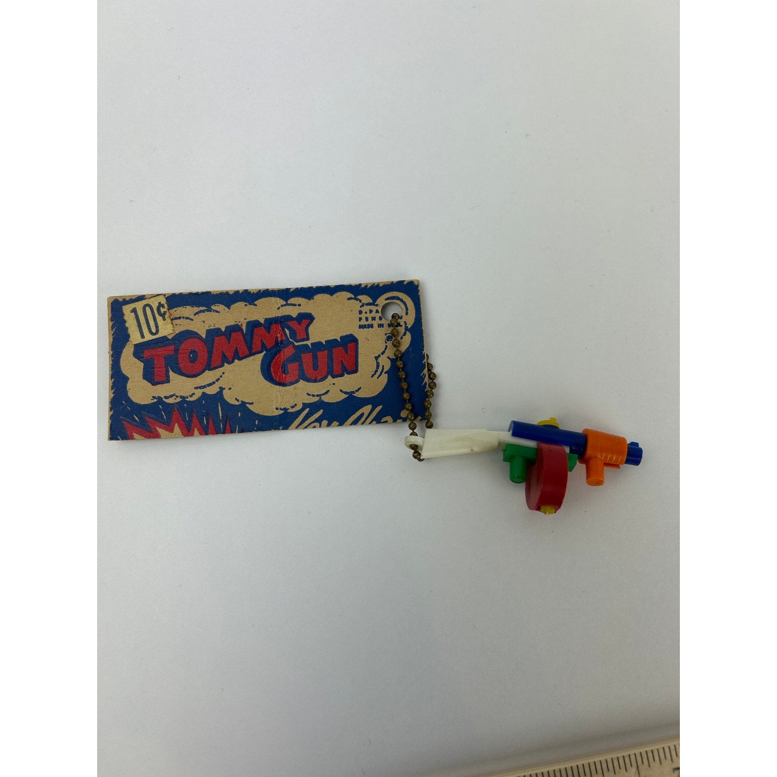 Vintage 1950s Tommy Gun Puzzle Key Chain Toy with Original 10¢ Card