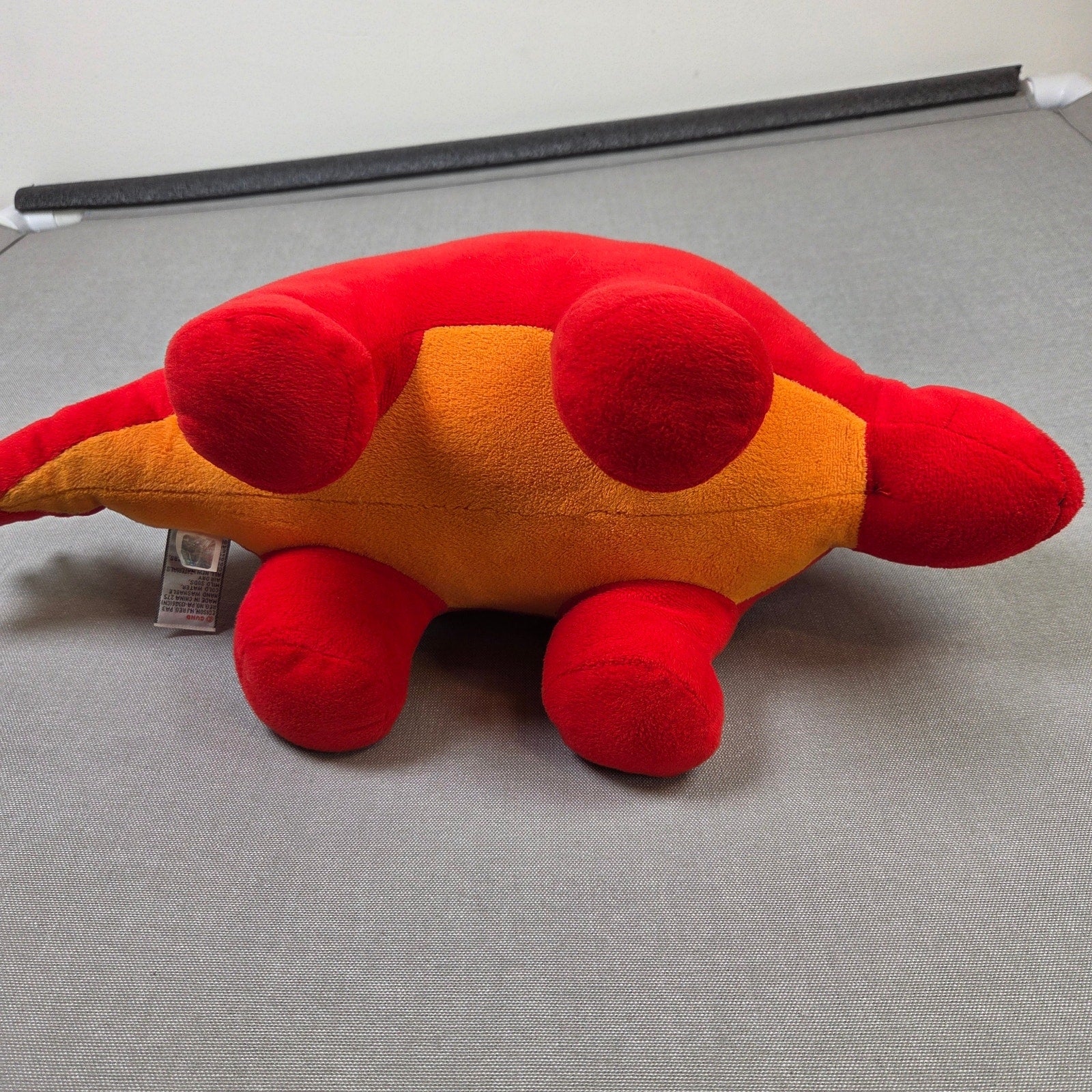 GUND Tailspin Stegosaurus Dinosaur Plush Red Orange Stuffed Animal Toy 18"