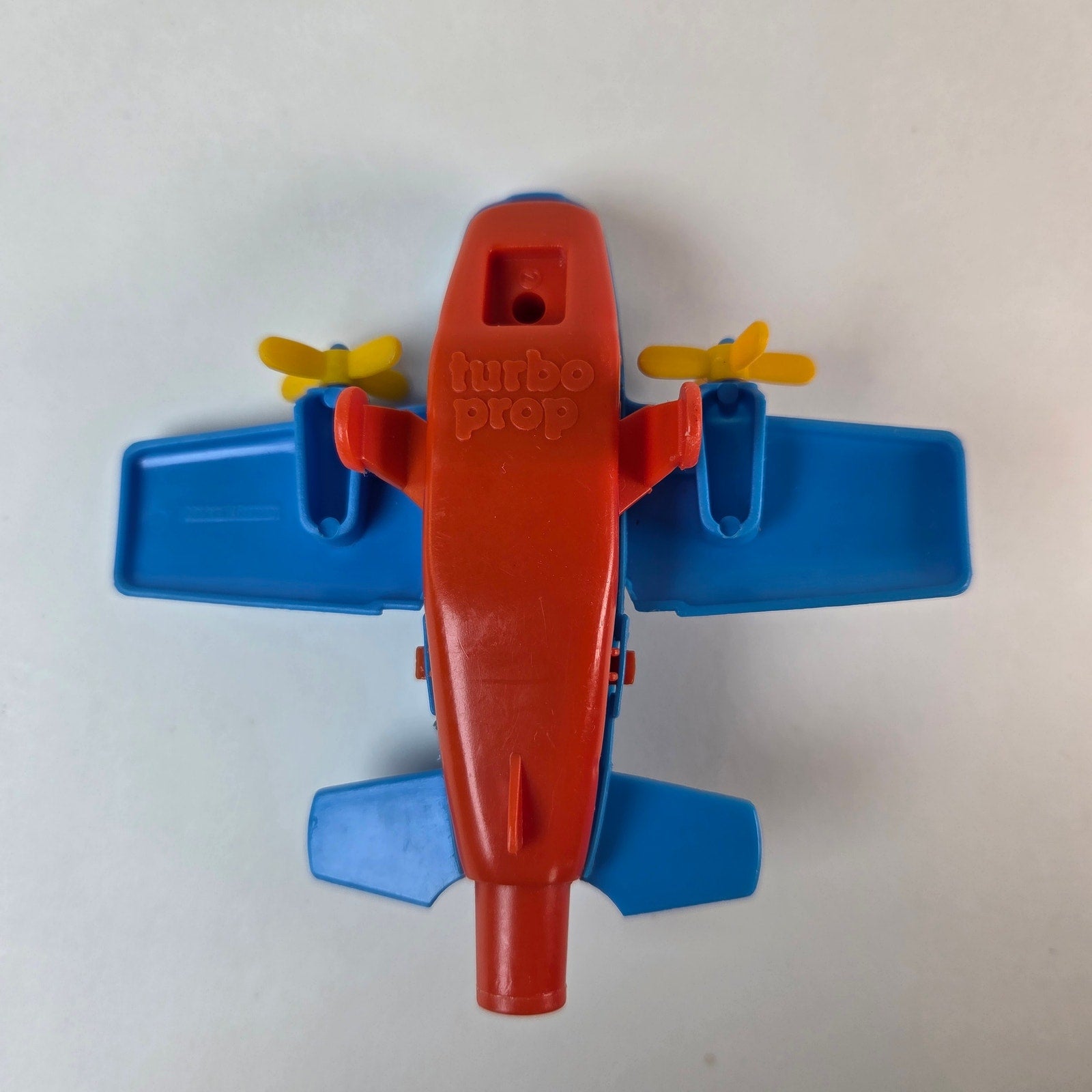 Vintage Turbo Prop Airplane Toy Blue Red Yellow Blowing Propellers Spins