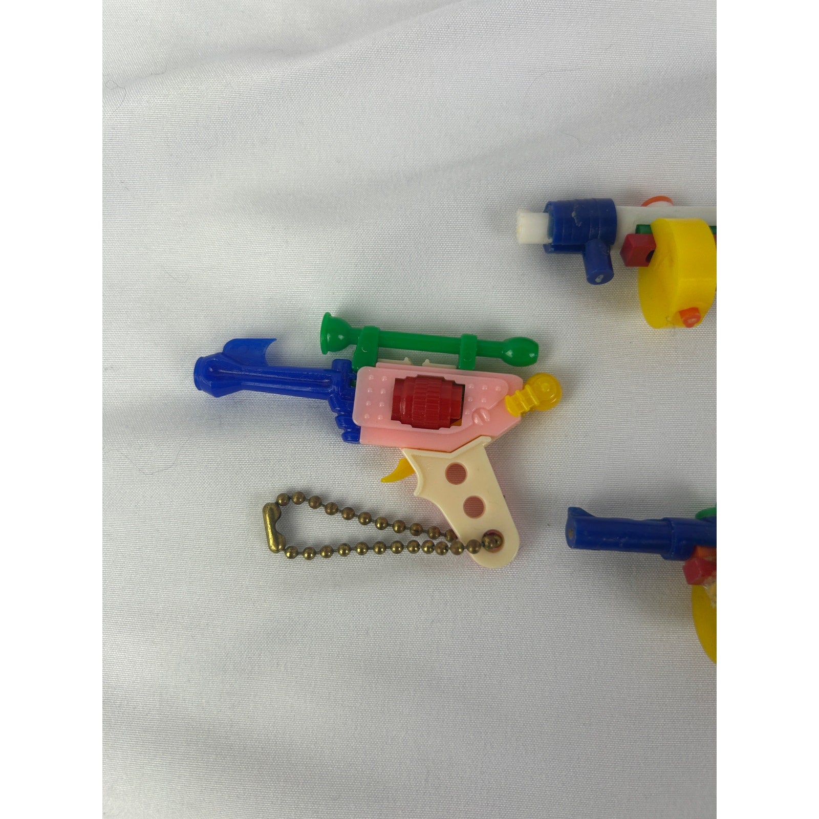 Vintage 1950s Puzzle Keychain Toy Gun Lot Western Revolvers Rifles