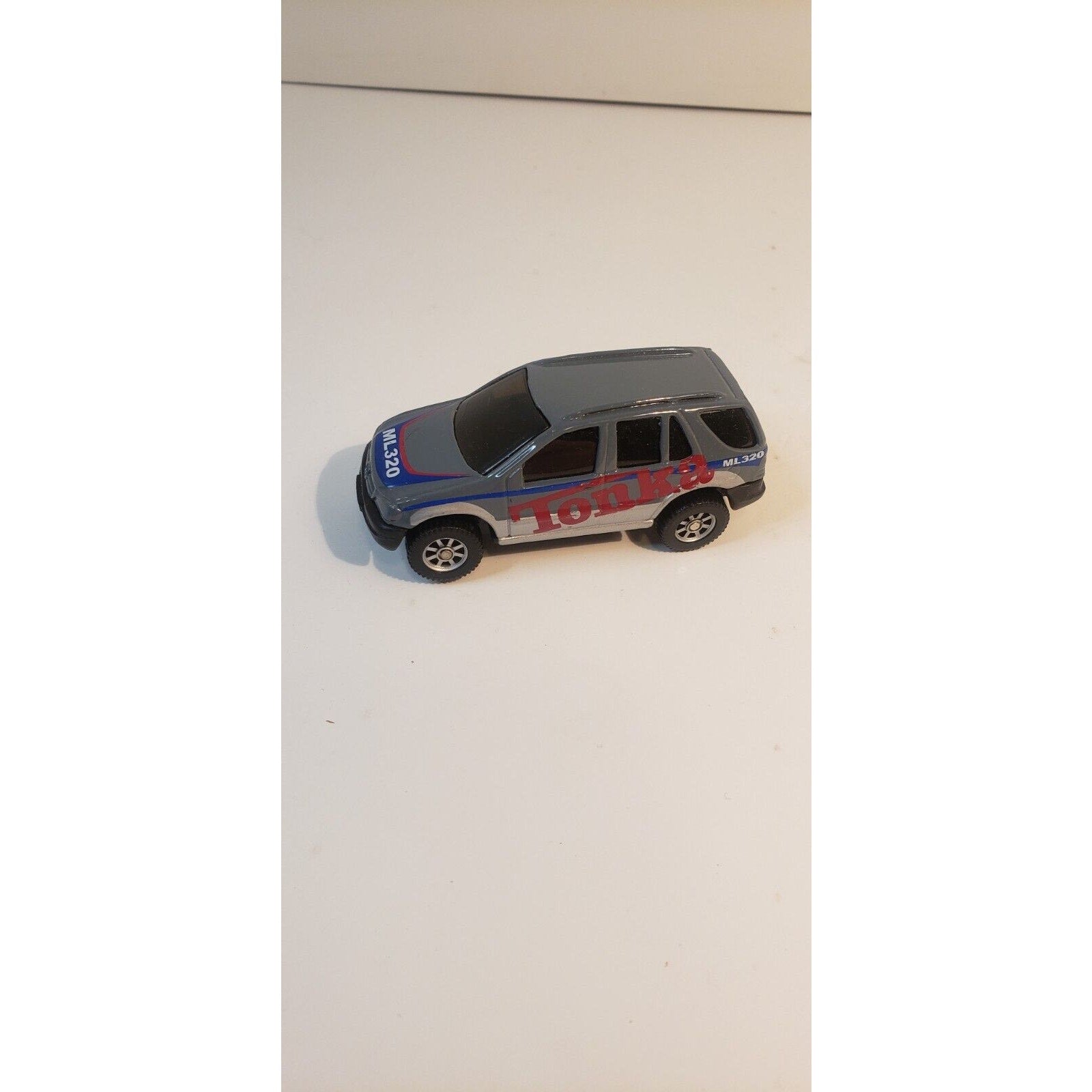 Maisto Tonka 2000 Mercedes-Benz ML 320 SUV Gray w/Red Lettering 1:64