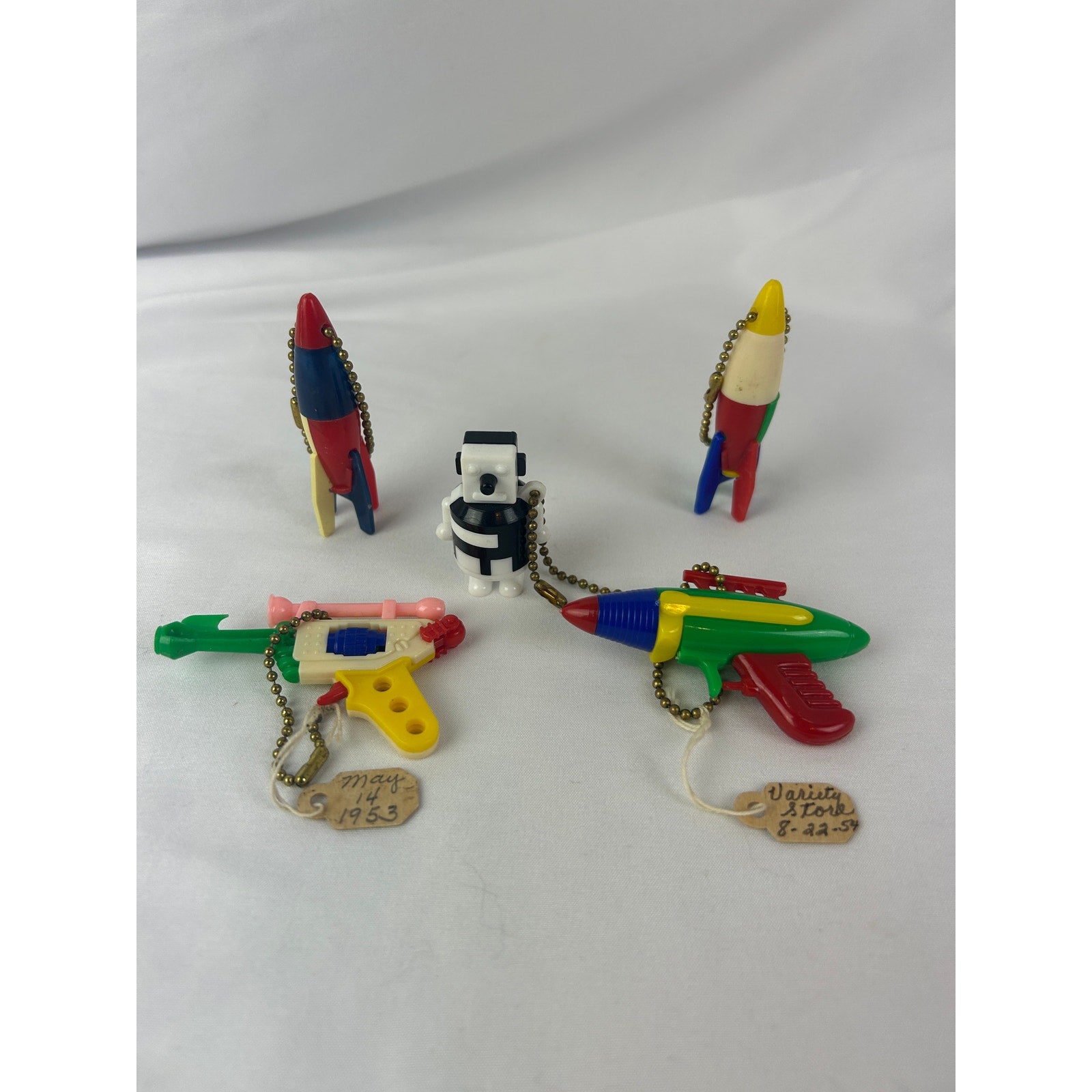 Vintage 1950s Space Toy Puzzle Keychain Lot Rockets Ray Guns Tagged
