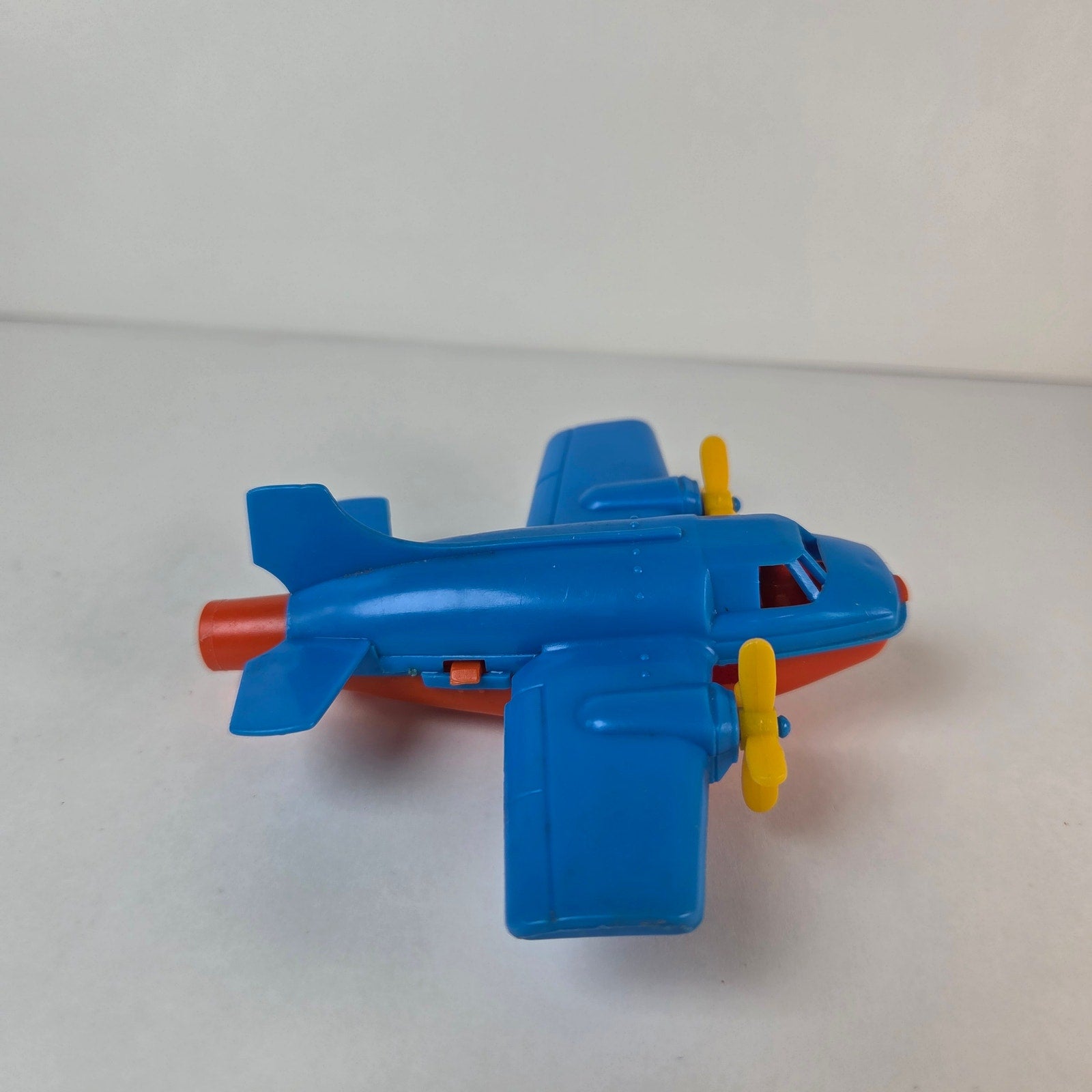 Vintage Turbo Prop Airplane Toy Blue Red Yellow Blowing Propellers Spins