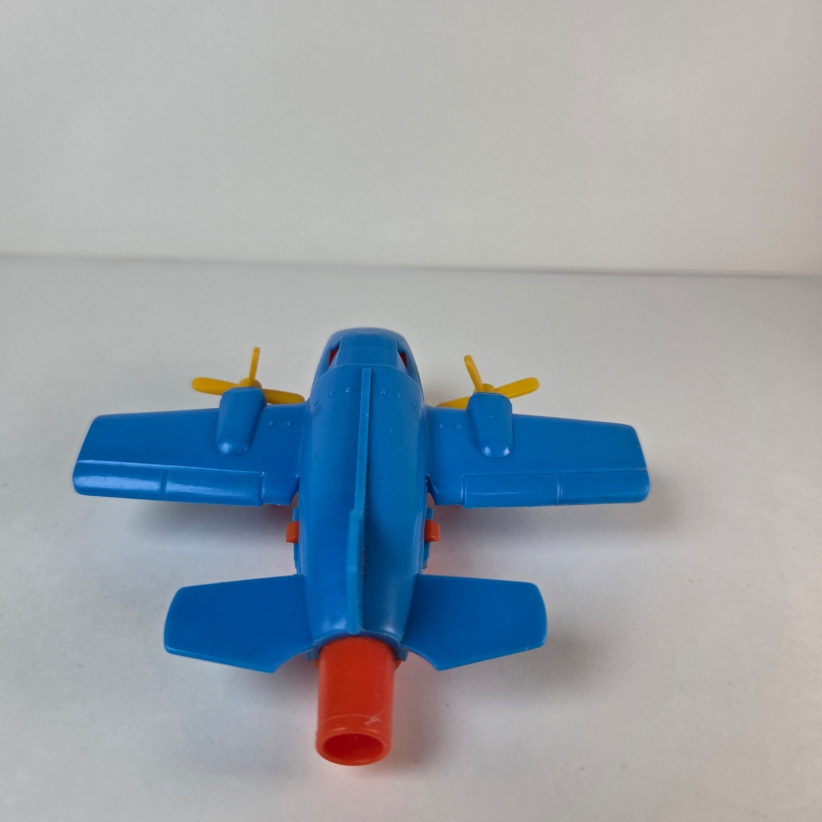Vintage Turbo Prop Airplane Toy Blue Red Yellow Blowing Propellers Spins