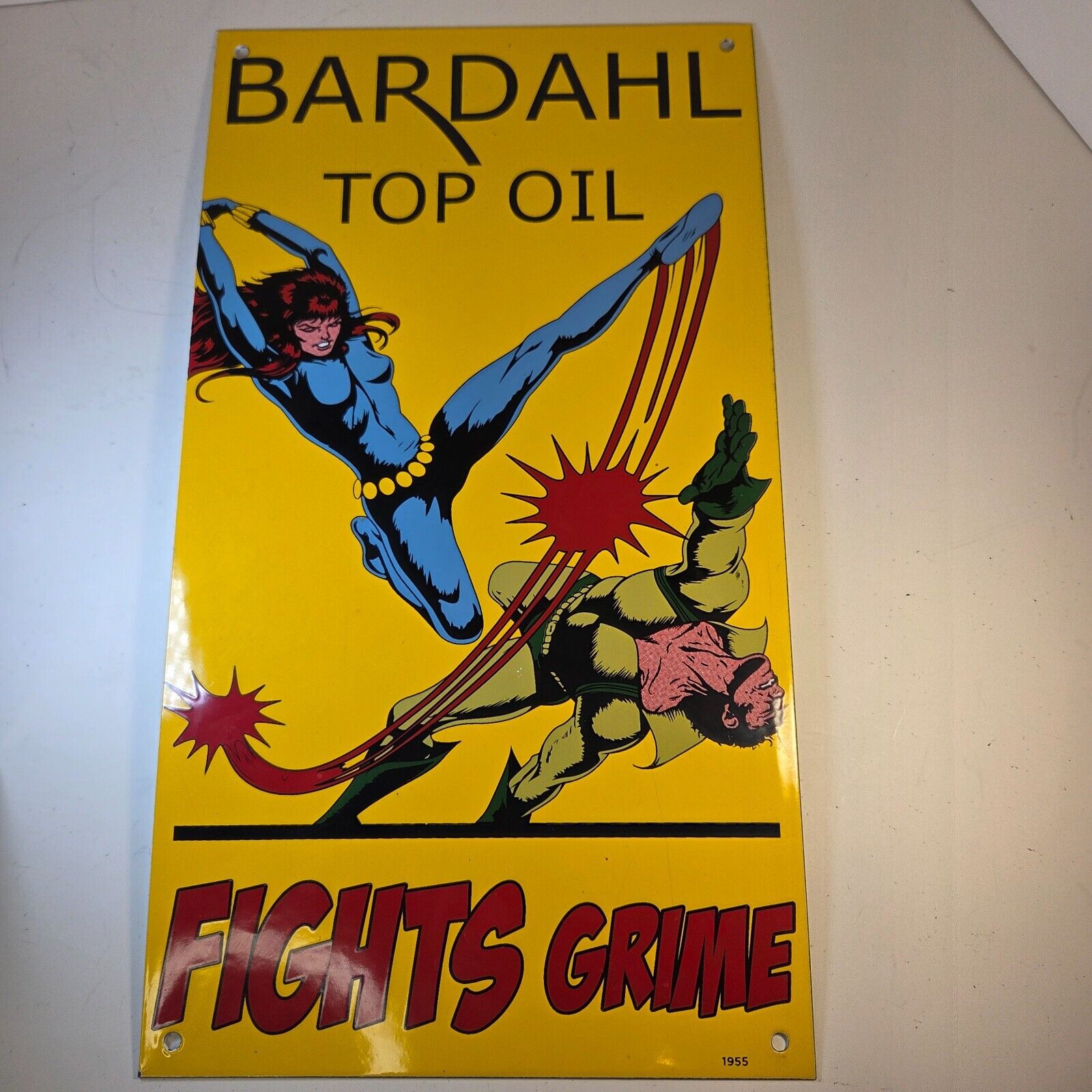 1955 Bardahl Top Oil Porcelain Sign – “Fights Grime” Comic Style Gas & Oil Ad 18x10