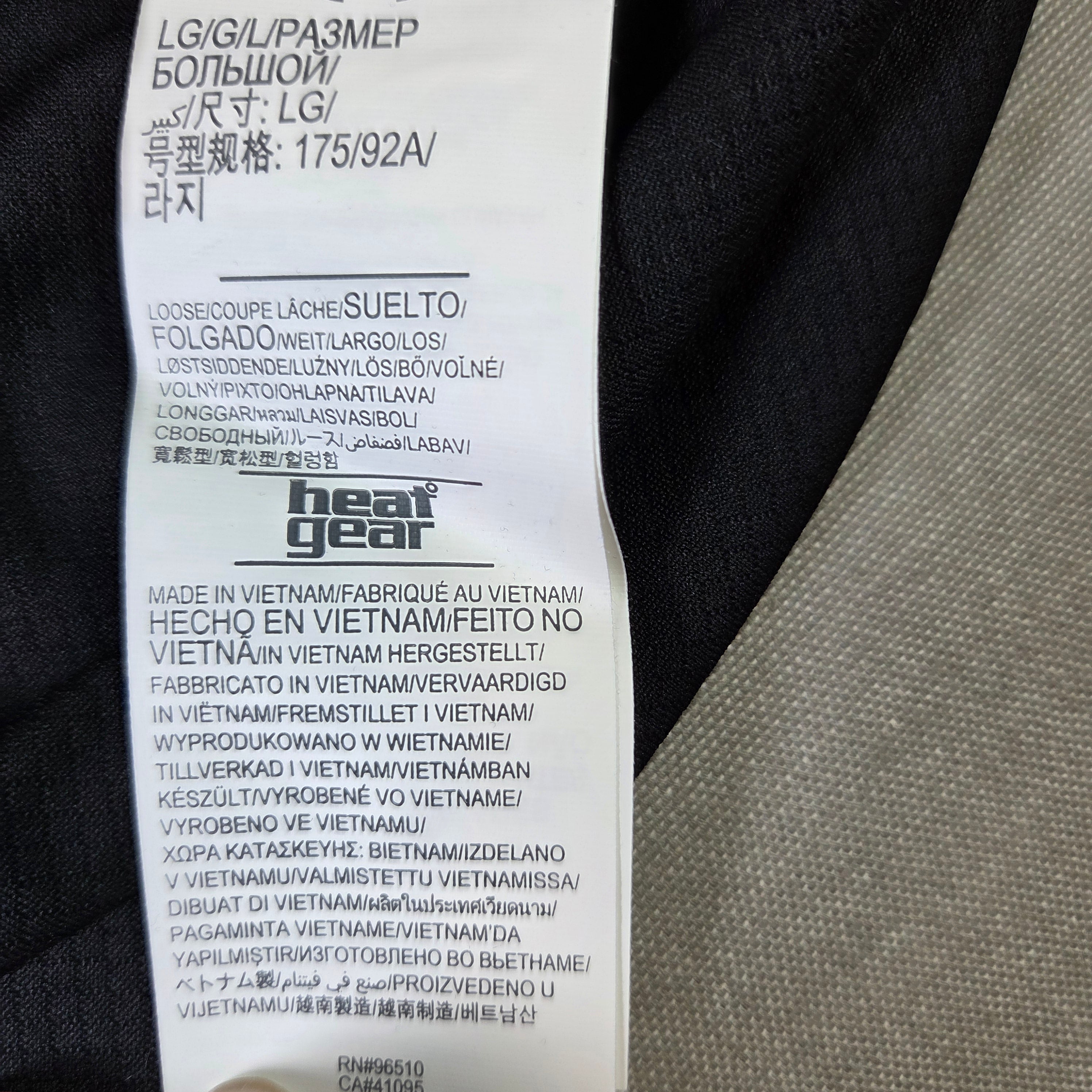 Under Armour Men's LG Black Golf Shirt with gray stipe and inside collar