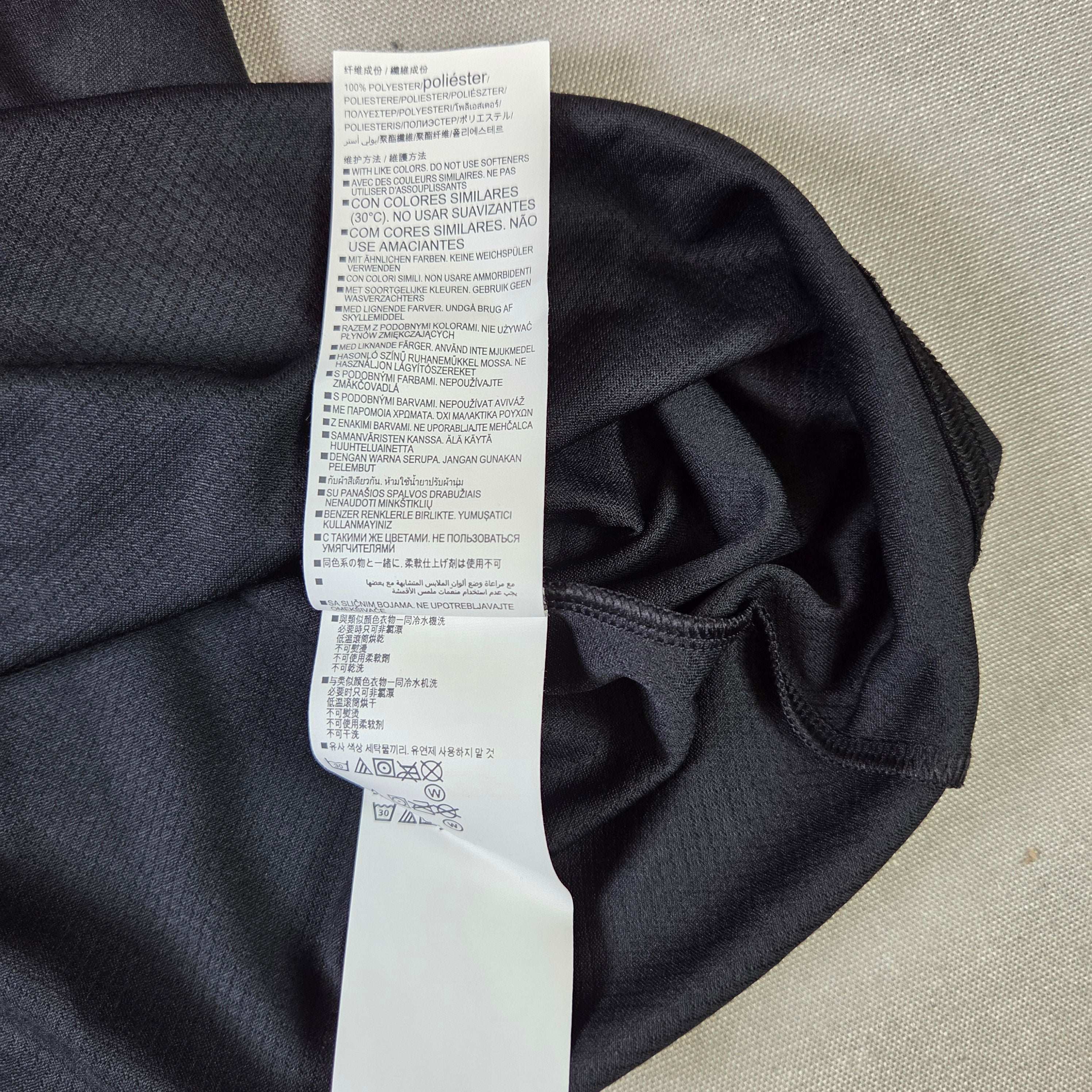 Under Armour Men's LG Black Golf Shirt with gray stipe and inside collar