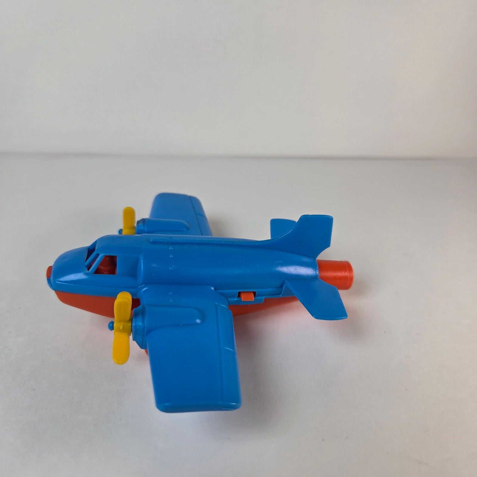 Vintage Turbo Prop Airplane Toy Blue Red Yellow Blowing Propellers Spins