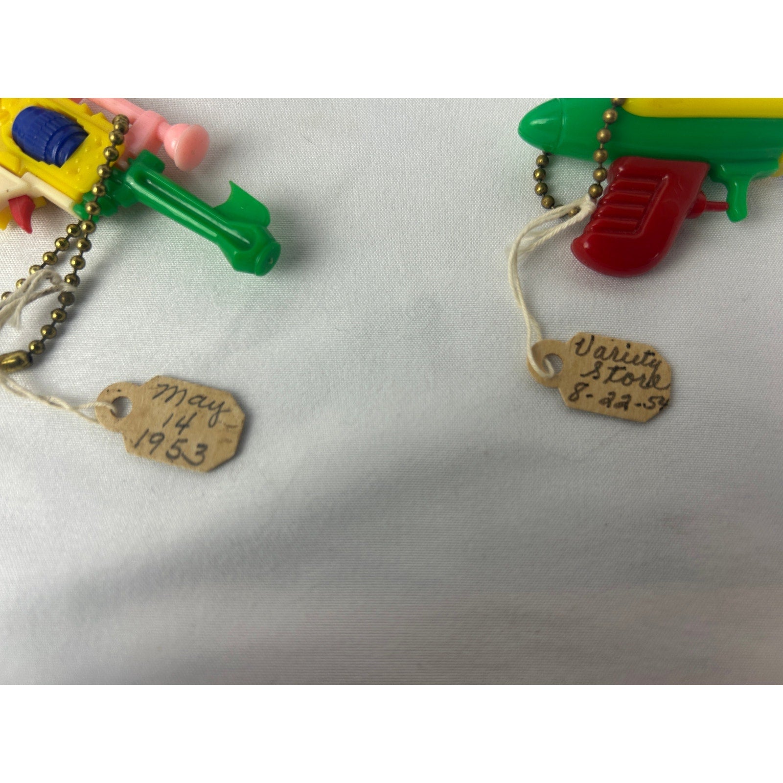 Vintage 1950s Space Toy Puzzle Keychain Lot Rockets Ray Guns Tagged