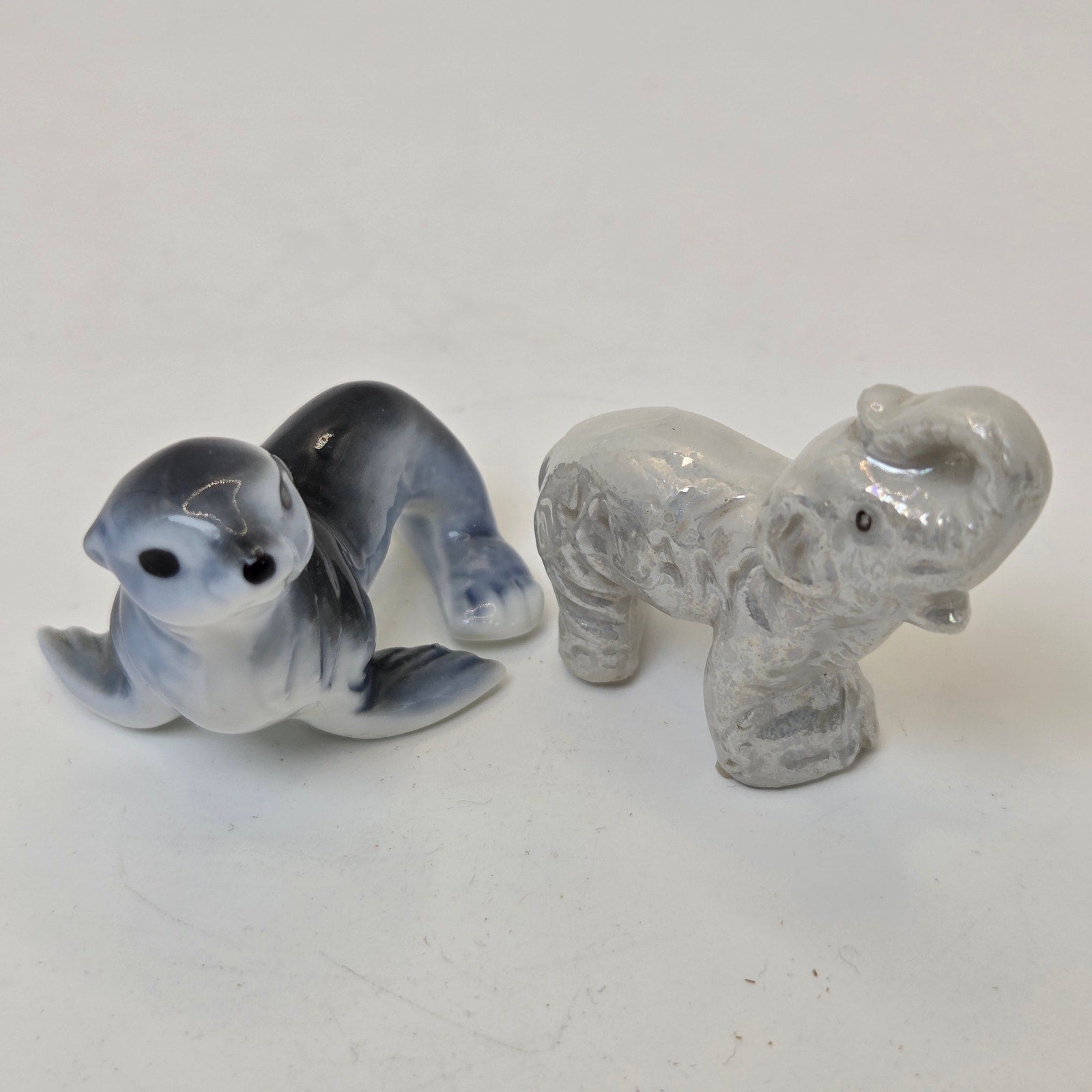 Miniature Ceramic Seal & Elephant Figurines Pair Unmarked Glazed Decor