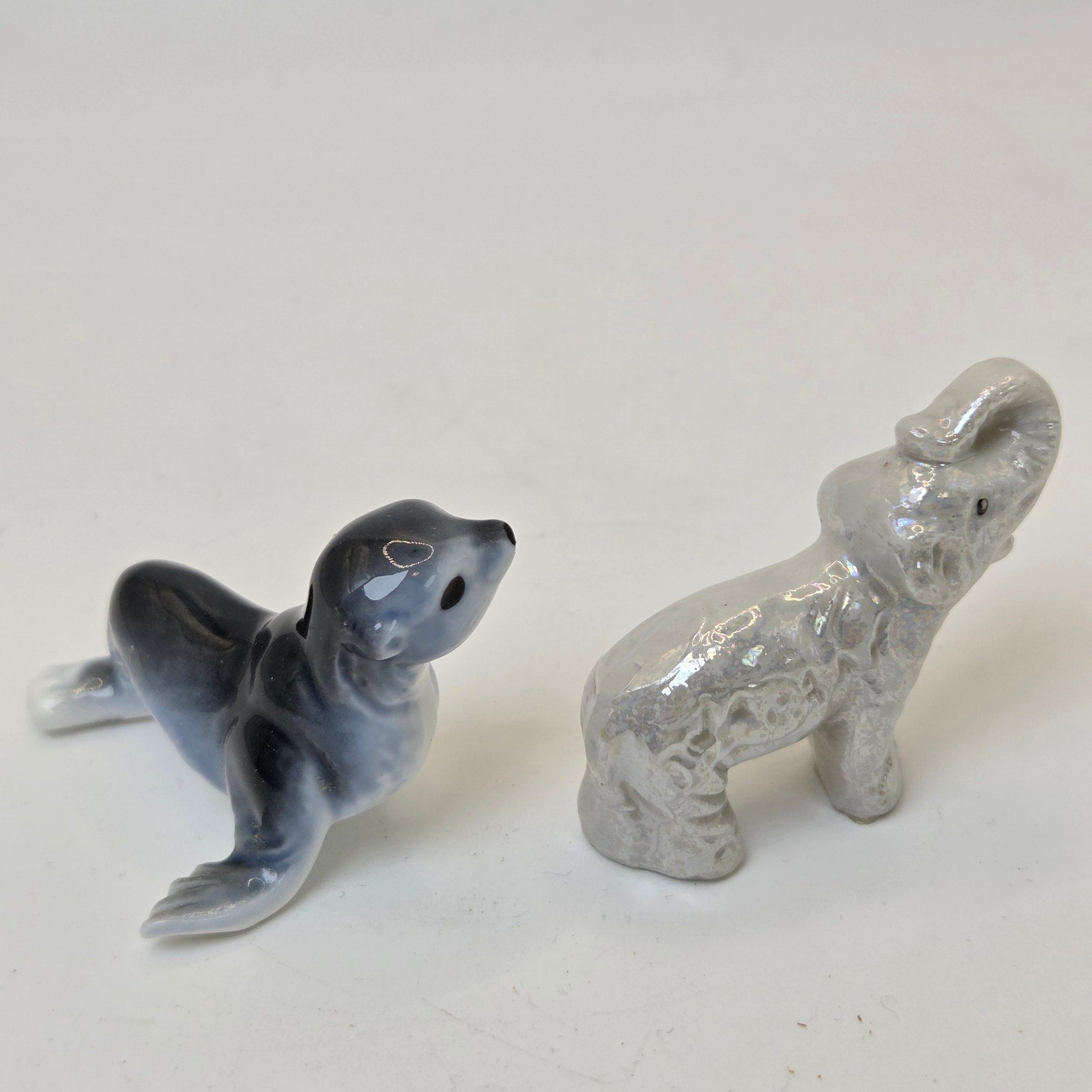 Miniature Ceramic Seal & Elephant Figurines Pair Unmarked Glazed Decor