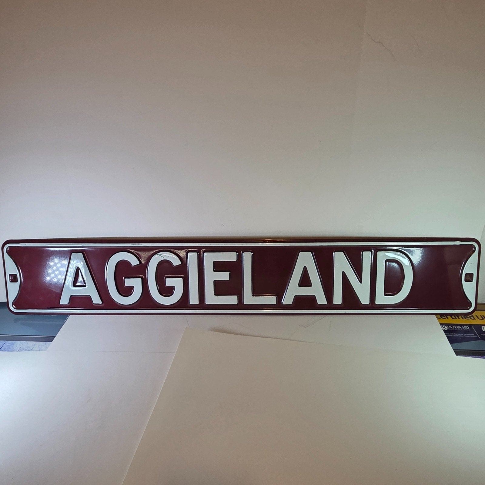 Texas A&M AGGIELAND Embossed Metal Street Sign Maroon White 36" x 6" – NCAA