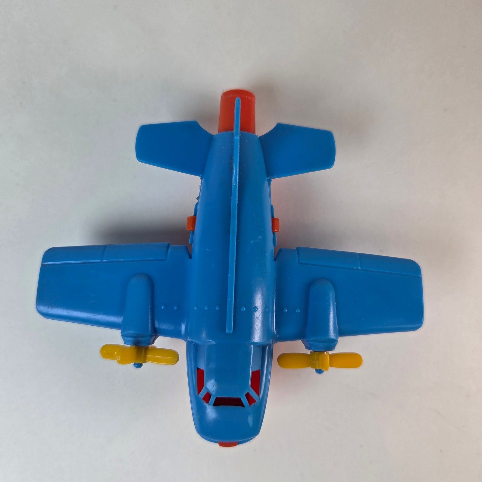 Vintage Turbo Prop Airplane Toy Blue Red Yellow Blowing Propellers Spins