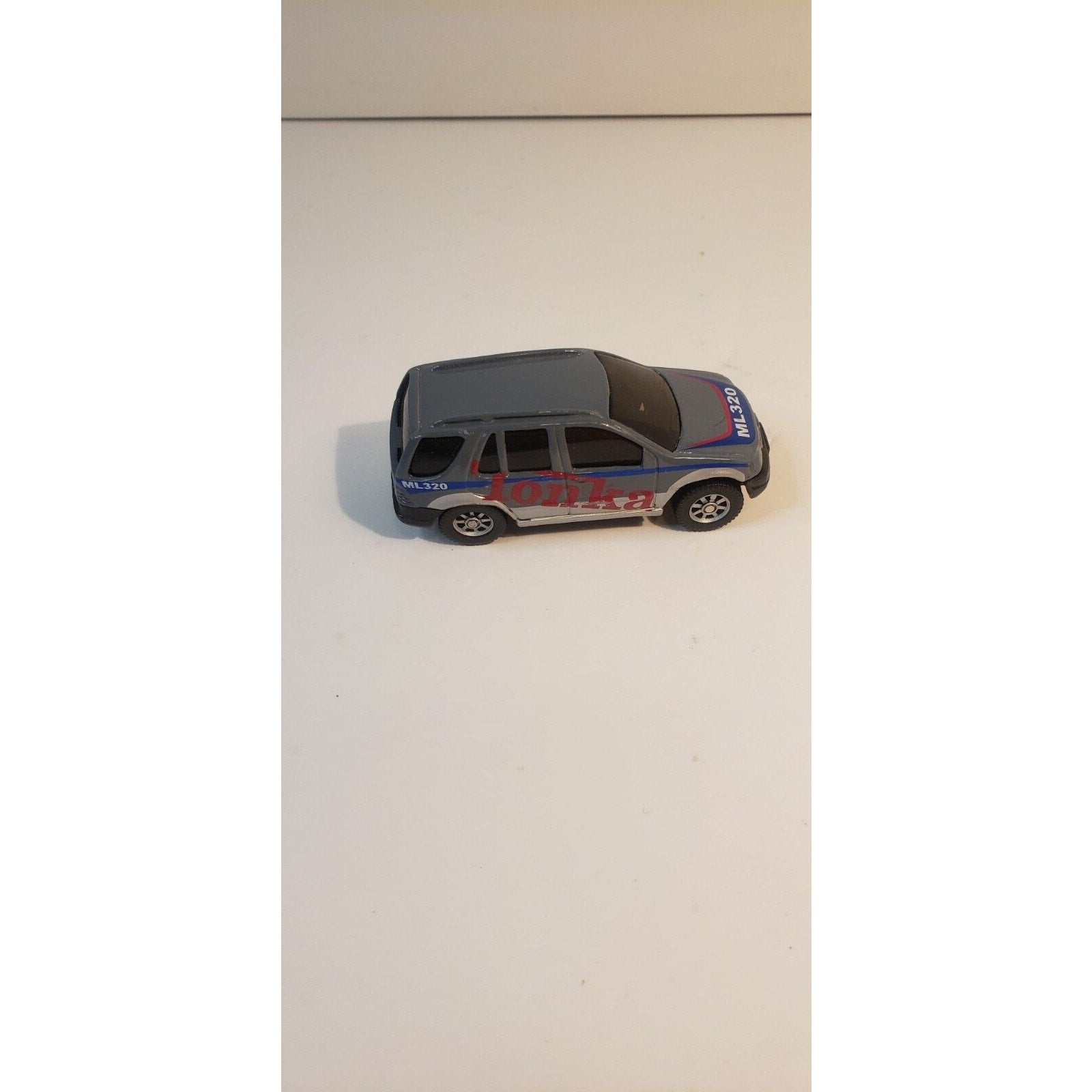 Maisto Tonka 2000 Mercedes-Benz ML 320 SUV Gray w/Red Lettering 1:64