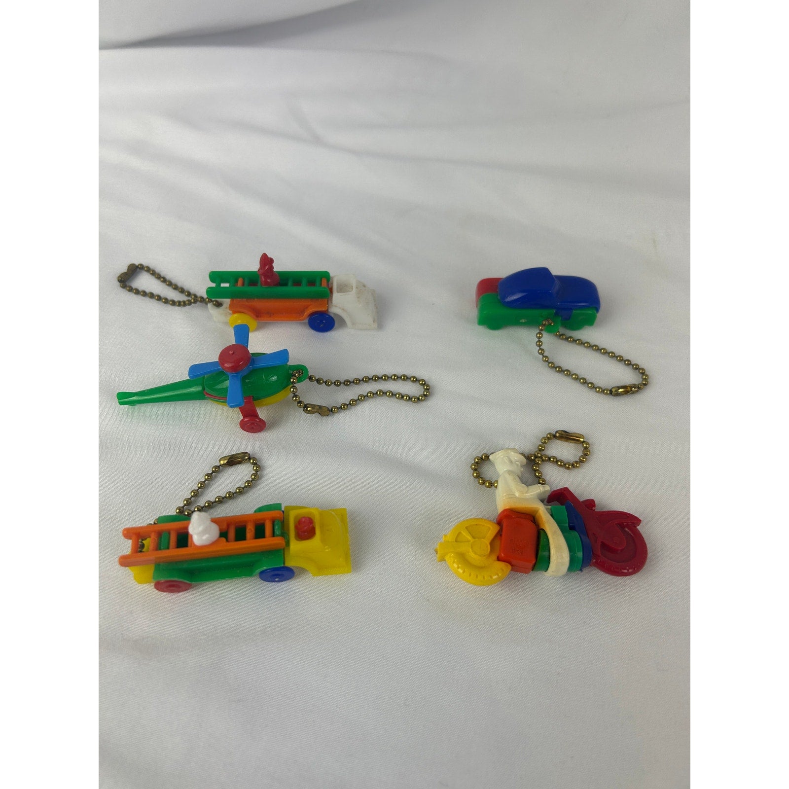 Vintage 1950s Vehicle Puzzle Keychain Lot Fire Truck Helicopter Toy