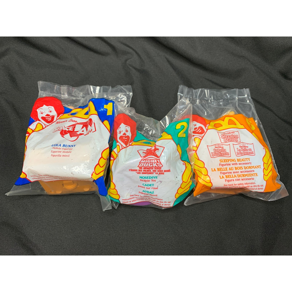 1996 McDonald's Happy Meal Toy Lot Space Jam Mighty Ducks Sleeping Beauty Sealed